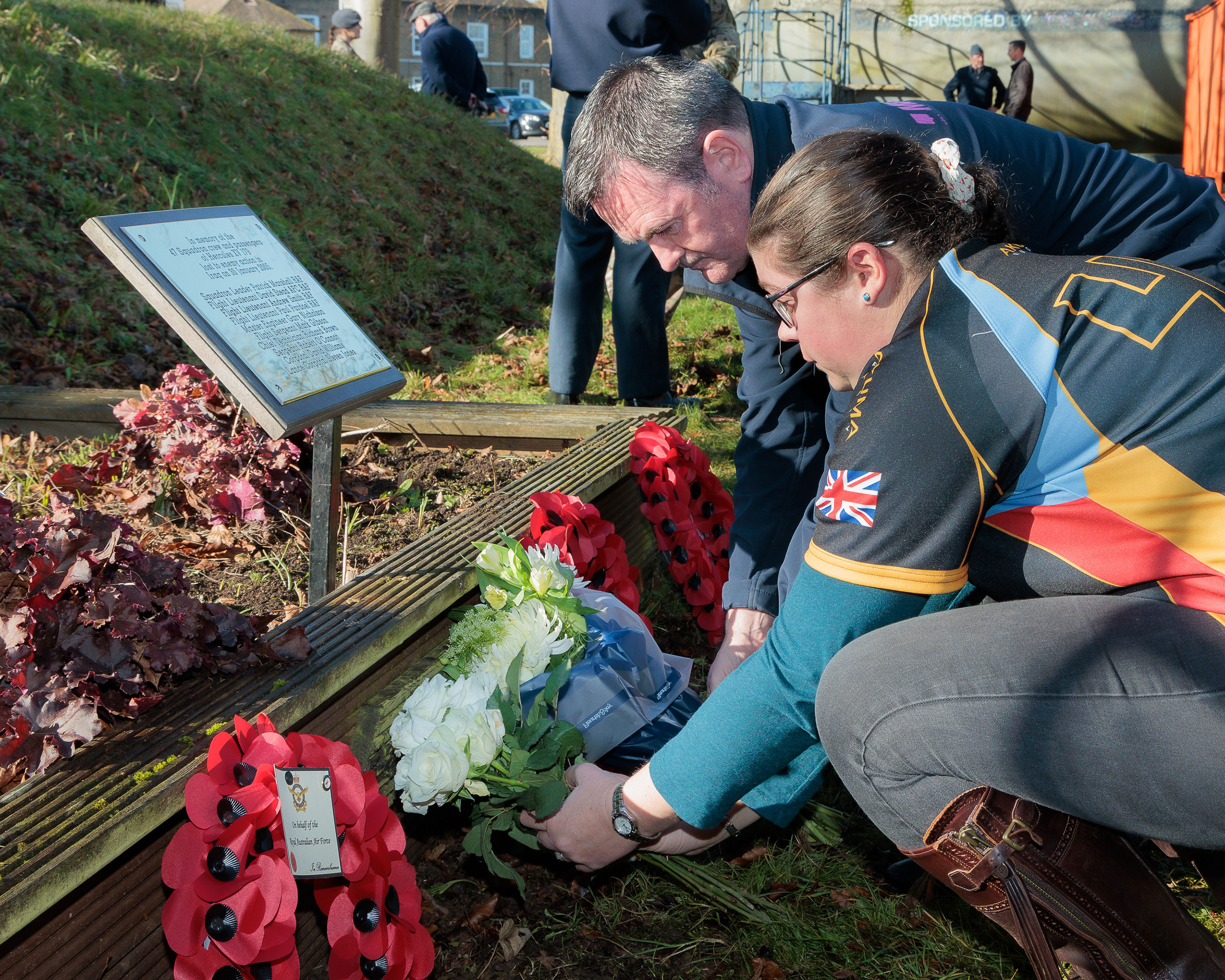 Photo depicting a gathering for the memorial service, at RAF Brize Norton, to mark 20 years since the crash of RAF C-130K Hercules XV179.